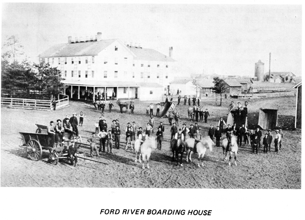 Historic Ford River Boarding House with people and horses.